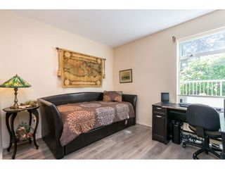 Photo 18: 102 2733 ATLIN Place in Coquitlam: Coquitlam East Condo for sale in "ATLIN COURT" : MLS®# R2475795