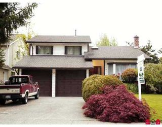 Photo 1: 19719 50A Ave in Langley: Langley City House for sale in "Eagle Heights" : MLS®# F2708352
