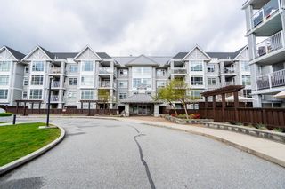 Main Photo: 404 3136 ST JOHNS Street in Port Moody: Port Moody Centre Condo for sale in "Sonrisa" : MLS®# R2868674
