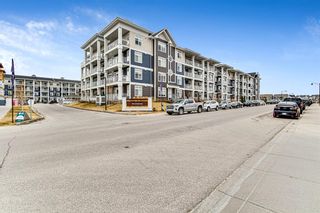 Photo 2: 208 200 Auburn Meadows Common SE in Calgary: Auburn Bay Apartment for sale : MLS®# A1211325