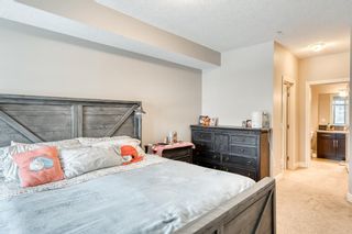 Photo 13: 3206 15 Sunset Square: Cochrane Apartment for sale : MLS®# A2031670