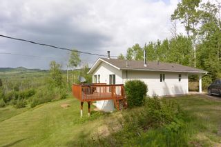 Photo 1: 8670 BLUFF Road in Telkwa: Telkwa - Rural House for sale (Smithers And Area)  : MLS®# R2801177