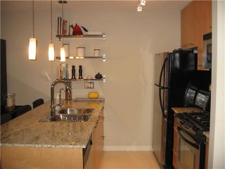 Photo 2: 703 2979 GLEN Drive in Coquitlam: North Coquitlam Condo for sale : MLS®# V840551