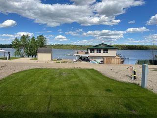 Main Photo: 18 25054 South Pine Lake Road: Rural Red Deer County Residential Land for sale : MLS®# A2137493