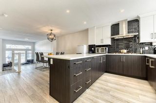 Photo 12: 633 Masters Road SE in Calgary: Mahogany Detached for sale : MLS®# A2032755