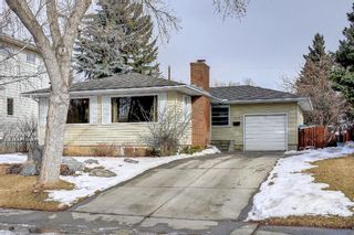 Photo 2: 1008 80 Avenue SW in Calgary: Chinook Park Detached for sale : MLS®# A1190996