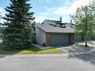 Photo 2: 18 185 Woodridge Drive SW in Calgary: Woodlands Row/Townhouse for sale : MLS®# A2078177