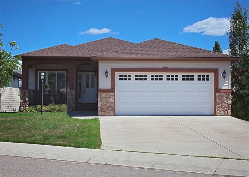 FEATURED LISTING: 15 SHEEP RIVER Heights Okotoks