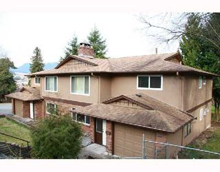 Photo 1: 1013A SADDLE Street in Coquitlam: Ranch Park Duplex for sale : MLS®# V693751