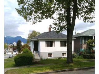 Photo 1: 2505 E 19TH Avenue in Vancouver: Renfrew Heights House for sale (Vancouver East)  : MLS®# V827171