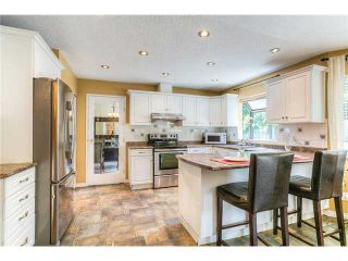 Photo 6: 589 CLEARWATER Way in Coquitlam: Coquitlam East House for sale : MLS®# V1129277
