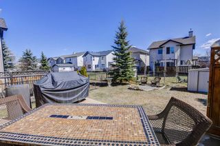 Photo 34: 28 Cougarstone Square SW in Calgary: Cougar Ridge Detached for sale : MLS®# A1099416