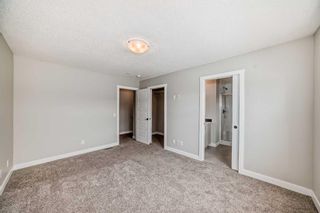 Photo 8: 919 Creekside Boulevard in Calgary: C-168 Semi Detached (Half Duplex) for sale : MLS®# A2143806
