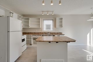 Photo 7: 7 4020 21 Street in Edmonton: Zone 30 House Half Duplex for sale : MLS®# E4311997