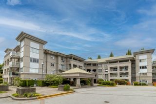 Photo 1: 114 10533 UNIVERSITY Drive in Surrey: Whalley Condo for sale in "Parkview Court" (North Surrey)  : MLS®# R2784030