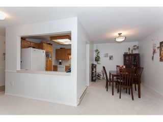 Photo 5: 102 5375 205 Street in Langley: Langley City Condo for sale in "GLENMONT PARK" : MLS®# R2053882