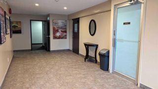 Photo 3: 310 1712 38 Street SE in Calgary: Forest Lawn Apartment for sale : MLS®# A2128746