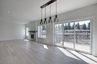 Photo 12: 433 Shawnee Boulevard SW in Calgary: Shawnee Slopes Detached for sale : MLS®# A1098238