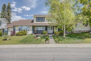 Photo 1: 108 Silvergrove Road NW in Calgary: Silver Springs Semi Detached for sale : MLS®# A1226861