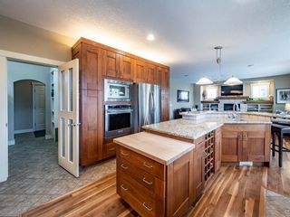 Photo 11: 30 Tusslewood Drive NW in Calgary: Tuscany Detached for sale : MLS®# A1106079