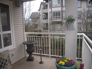 Photo 9: 202 130 W 22ND Street in North Vancouver: Central Lonsdale Condo for sale in "The Emerald" : MLS®# V936166