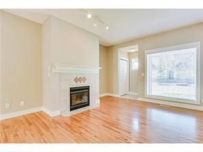 Photo 2: 183 Bridlewood View SW in Calgary: Bridlewood Row/Townhouse for sale : MLS®# A2014089