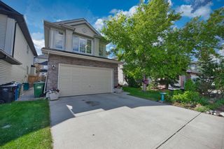 Photo 1: 33 Simcoe Circle SW in Calgary: Signal Hill Detached for sale : MLS®# A2053869