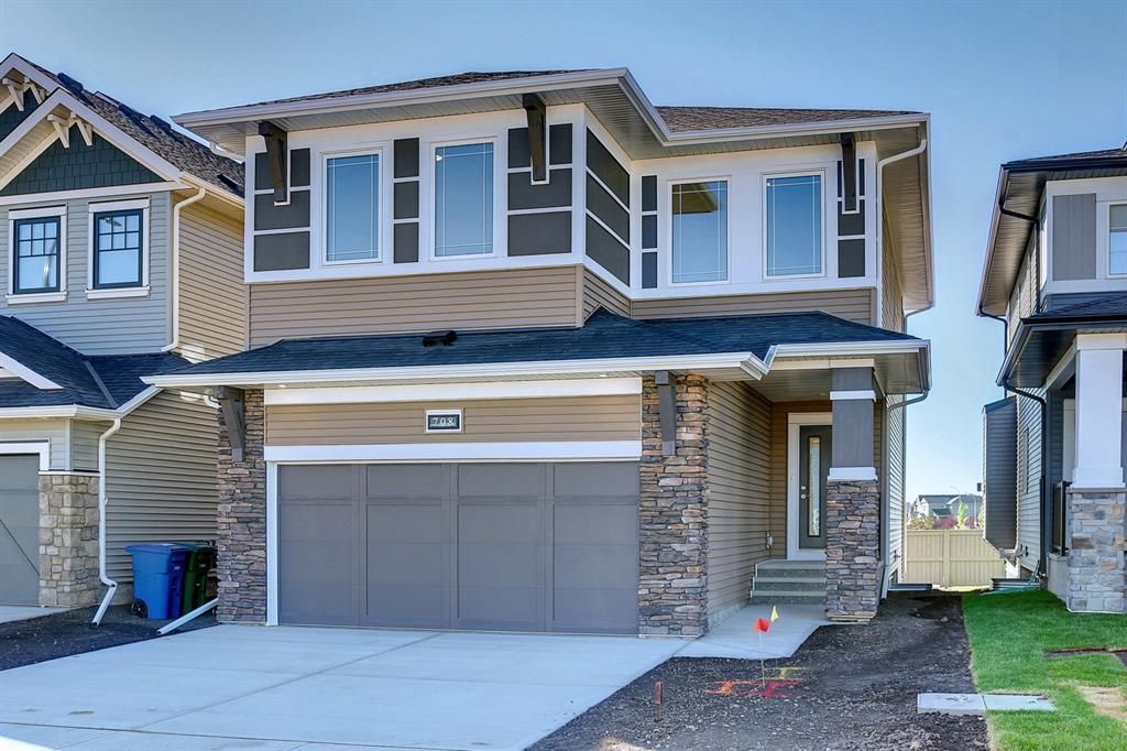 Main Photo: 708 Reynolds Crescent SW Airdrie