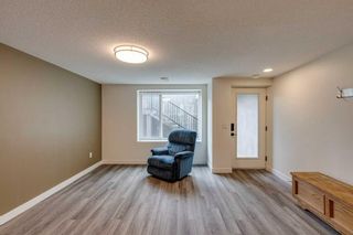 Photo 6: 127 Panatella Square NW in Calgary: Panorama Hills Row/Townhouse for sale : MLS®# A2127980