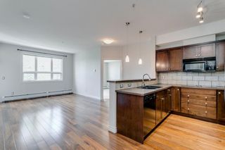 Photo 3: 352 26 Val Gardena View SW in Calgary: Springbank Hill Apartment for sale : MLS®# A1214964