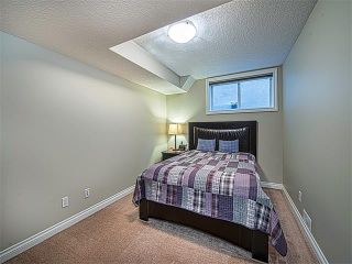 Photo 26: 113 ROCKFORD Road NW in Calgary: Rocky Ridge House for sale : MLS®# C4079306