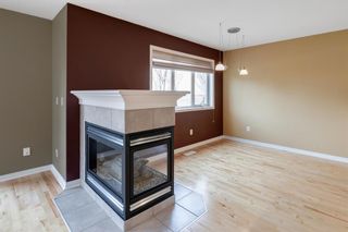 Photo 9: 180 Simcoe Place SW in Calgary: Signal Hill Row/Townhouse for sale : MLS®# A1218089