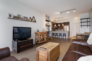 Photo 1: 211 25 Auburn Meadows Avenue SE in Calgary: Auburn Bay Apartment for sale : MLS®# A1214157