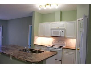Photo 6: 304 72 Quigley Drive: Cochrane Apartment for sale : MLS®# A1196956