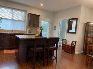 Photo 5: 6908 208 Street in Langley: Willoughby Heights Condo for sale in "Milner Heights" : MLS®# R2651186