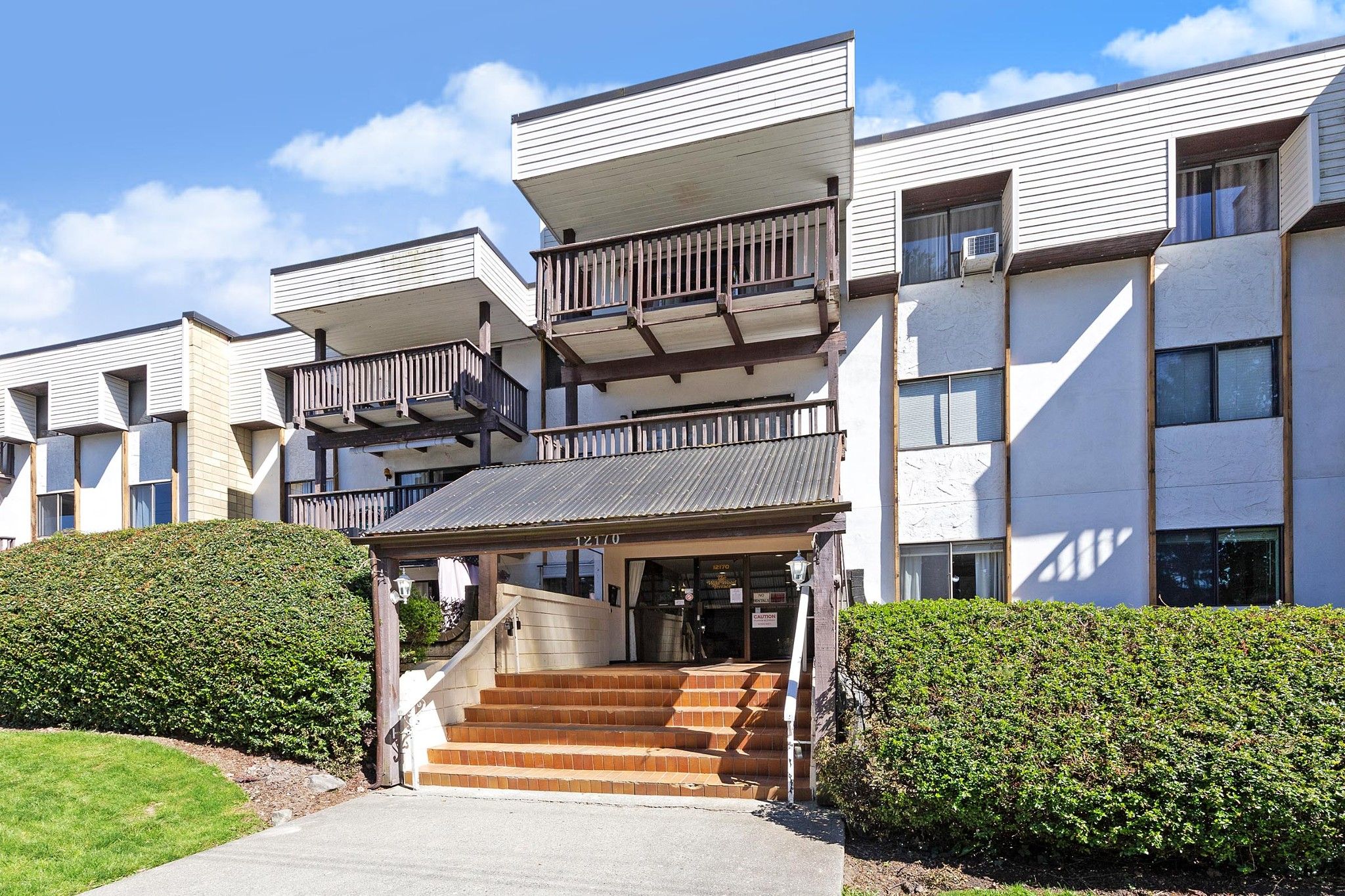 Main Photo: 101 12170 222 Street in Maple Ridge: West Central Condo for sale in "WILDWOOD TERRACE" : MLS®# R2566877