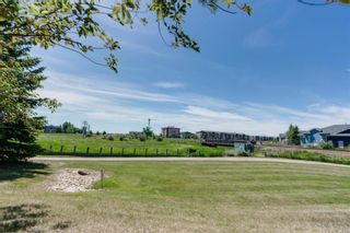 Photo 5: 319 305 1 Avenue NW: Airdrie Apartment for sale : MLS®# A1148151
