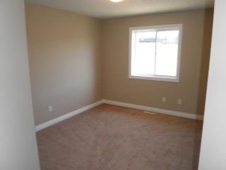 Photo 11: 7218 OGDEN Road SE in CALGARY: Ogden Lynnwd Millcan Residential Attached for sale (Calgary)  : MLS®# C3535952