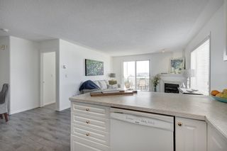 Photo 8: 2109 7451 Springbank Boulevard SW in Calgary: Springbank Hill Apartment for sale : MLS®# A2034205