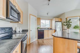 Photo 11: 201 70 Panatella Landing NW in Calgary: Panorama Hills Row/Townhouse for sale : MLS®# A2074229