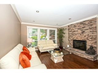Photo 2: 1622 HEMLOCK Place in Port Moody: Mountain Meadows House for sale : MLS®# V1127052