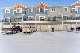 Photo 1: 4 Stonehouse Crescent NW: High River Row/Townhouse for sale : MLS®# A2104440