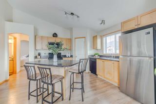 Photo 1: 201 70 Panatella Landing NW in Calgary: Panorama Hills Row/Townhouse for sale : MLS®# A2074229