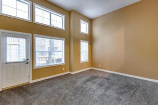 Photo 11: 101 Panatella Road NW in Calgary: Panorama Hills Row/Townhouse for sale : MLS®# A2030502