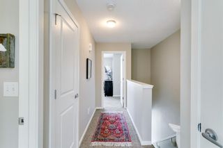 Photo 20: 304 Ascot Circle SW in Calgary: Aspen Woods Row/Townhouse for sale : MLS®# A1217542