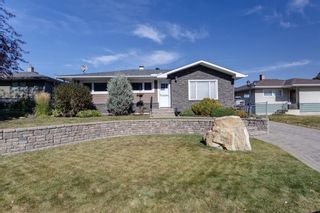 Photo 1: 608 86 Avenue SW in Calgary: Haysboro Detached for sale : MLS®# A2003844