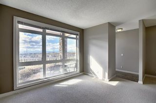 Photo 6: 4 145 Rockyledge View NW in Calgary: Rocky Ridge Apartment for sale : MLS®# A1041175