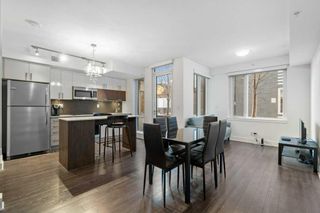 Photo 1: 120 619 Confluence Way SE in Calgary: Downtown East Village Apartment for sale : MLS®# A2114124