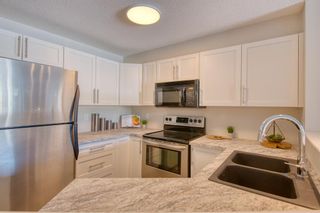 Photo 6: 7203 304 Mackenzie Way SW: Airdrie Apartment for sale : MLS®# A2032823