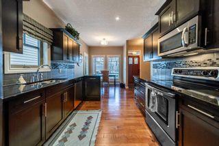Photo 10: 241 Bridle Estates Road SW in Calgary: Bridlewood Semi Detached (Half Duplex) for sale : MLS®# A2091110